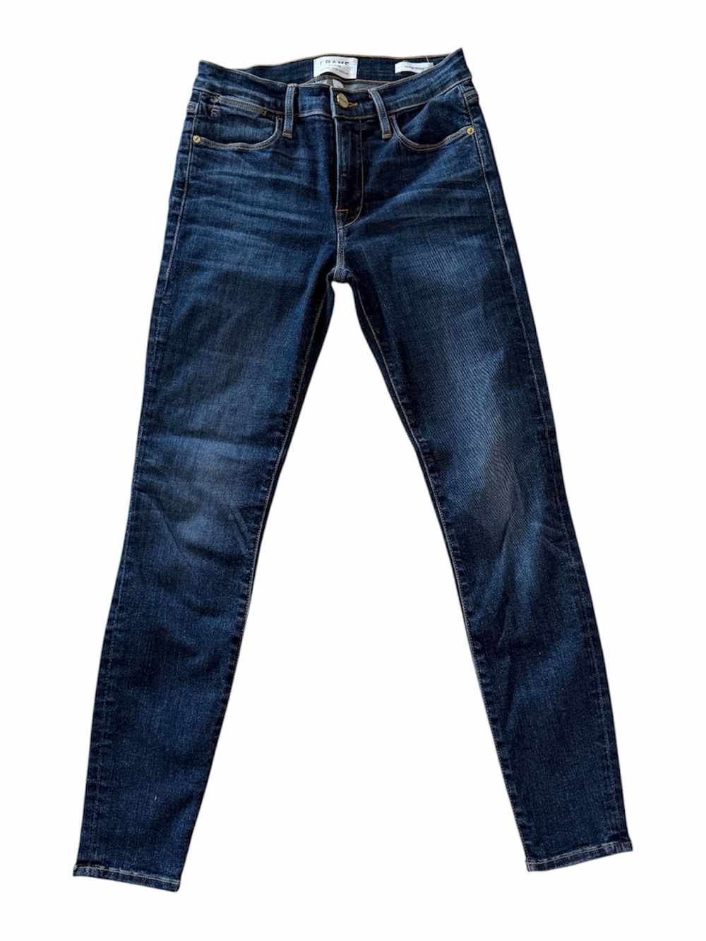Frame Le High skinny jeans in a blue wash stretch denim.
